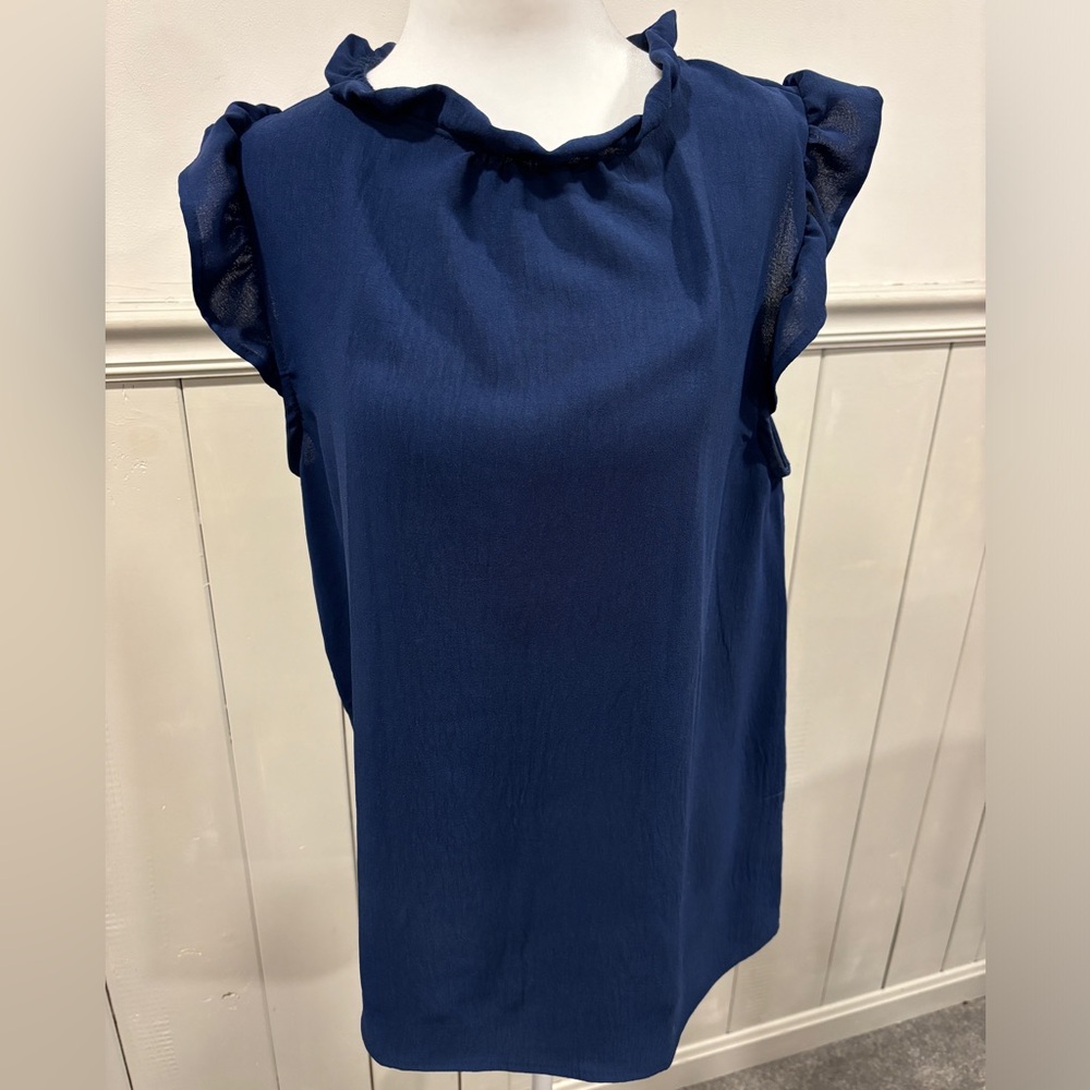 Betsy’s Boutique Shop ruffle sleeveless blouse top